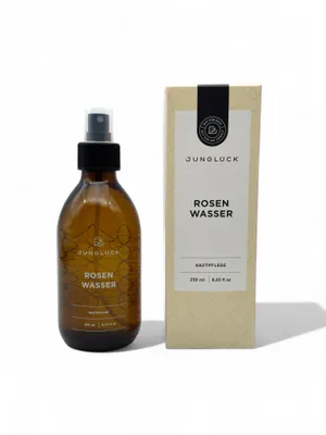 Produktbild von JUNGLÜCK BIO Rosenwasser Spray 250ml, Vegan, Alkoholfrei, Natürliches Gesichtswasser für porentiefe Reinigung & erfrischende Pflege von Haut & Haaren
