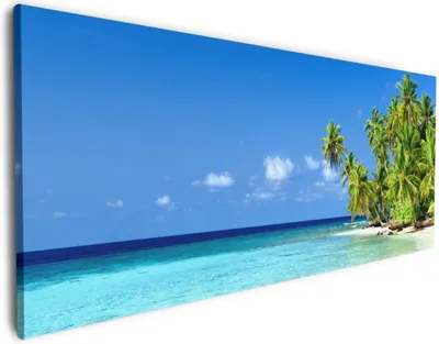 Produktbild von Wallario Premium Leinwandbild Blauer Himmel  weißer Strand  Palmen und das tiefblaue Meer in Größe 80 x 200 cm