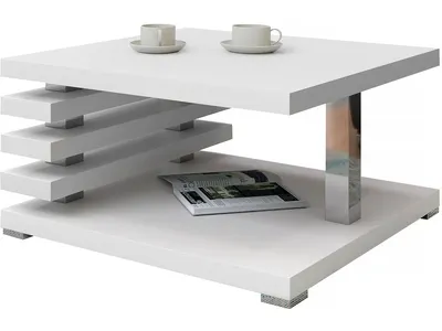 A white coffee table with a modern design, featuring two shelves and a chrome leg. Two coffee cups and saucers are on the top shelf, and a magazine is on the lower shelf.