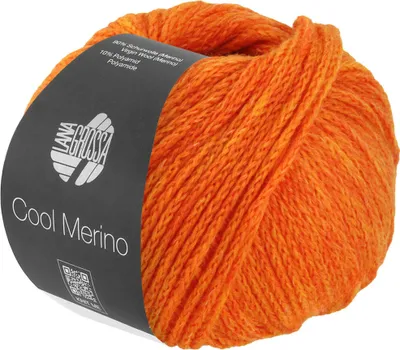 A ball of orange yarn with a label.