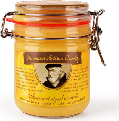 A jar of yellow liqueur with a label featuring a portrait of an old man.