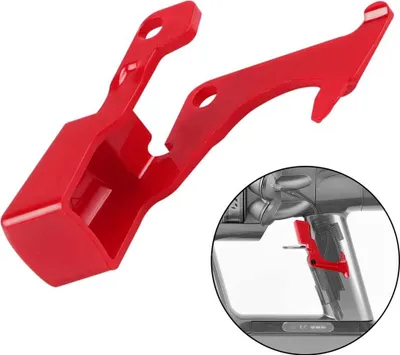 A red plastic accessory for a vacuum cleaner, shown in isolation and with an inset showing its application.