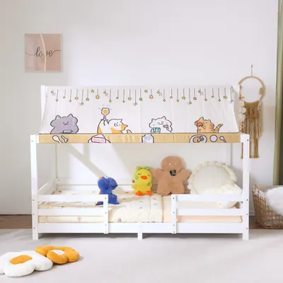A white wooden bunk bed with a decorative canopy featuring cartoon cats and stars.