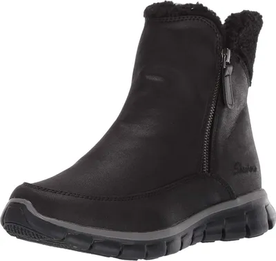 A black Skechers boot is shown against a white background.