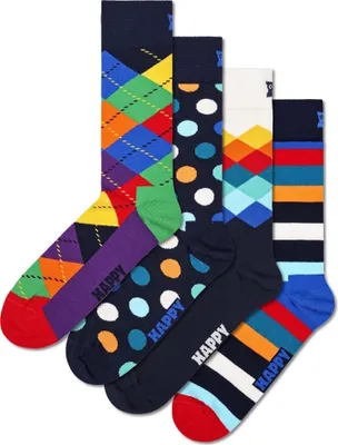 A collection of four pairs of colorful socks arranged diagonally.