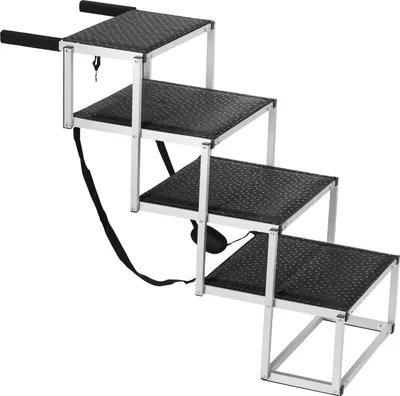 A four-step folding dog ramp made of aluminum with black textured steps and black handles.