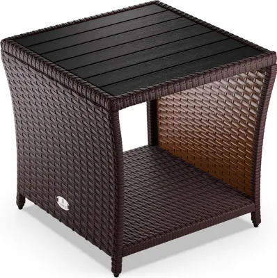 A brown polyrattan side table with a black WPC tabletop is shown against a white background.