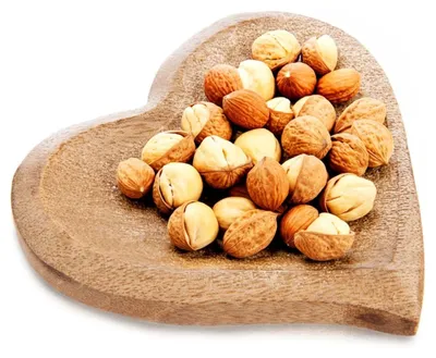 Produktbild von Herzförmiger Snackteller aus Mangoholz, 25 x 25 cm