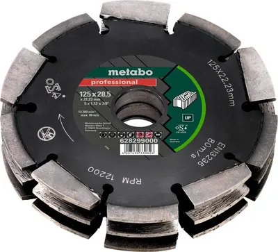 A close-up, professional studio shot of a Metabo diamond cutting disc.