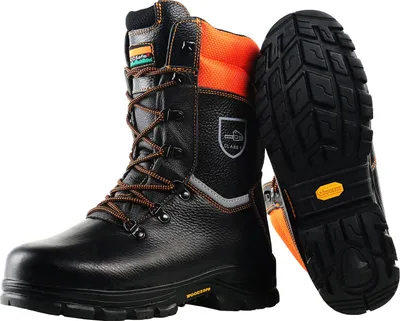 A pair of black and orange work boots are shown against a white background.
