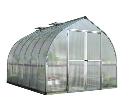 A silver and clear greenhouse on a white background.