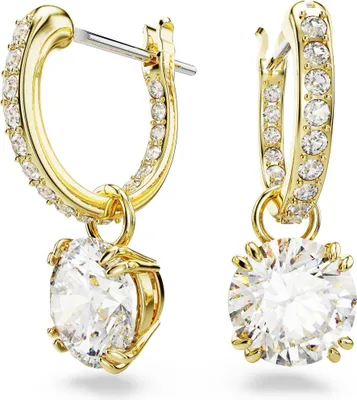 A pair of gold-colored hoop earrings with clear crystals and a large clear drop stone.