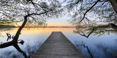 Produktbild von Tulup Glas-Bild -140x70- Wandkunst Dekorative Wand für Küche & Wohnzimmer - Landschaften - Pier am See - Blau