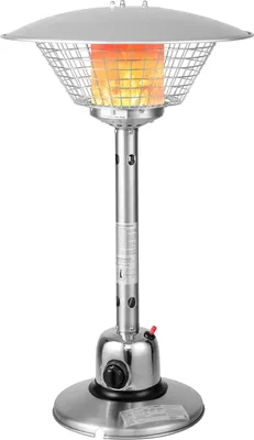 A silver patio heater with a flame visible inside the wire cage.
