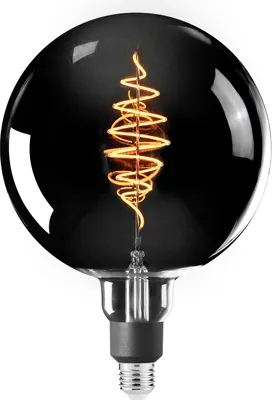 A close-up studio shot of a large, spherical, black-tinted LED light bulb with a visible filament inside.
