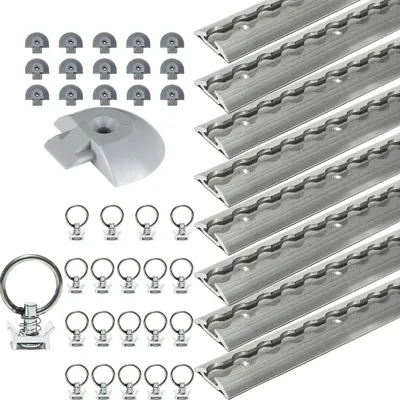 A collection of tie-down tracks and accessories for securing cargo.