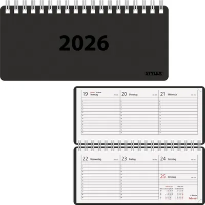 A black spiral-bound desk calendar for the year 2026 is shown open, displaying a weekly layout.