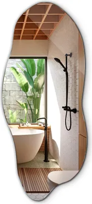 A modern bathroom with a freestanding bathtub and a shower.