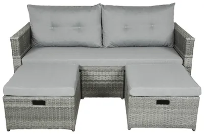 Gartensofa MALTA aus Polyrattan in Schilfgrau mit ausziehbaren Fußhockern und grauen Auflagen in Gesamtansicht.