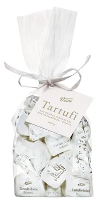 A bag of individually wrapped white chocolate truffles.