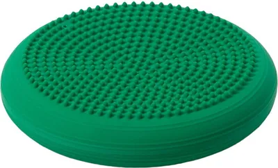 A green balance cushion with a textured surface.