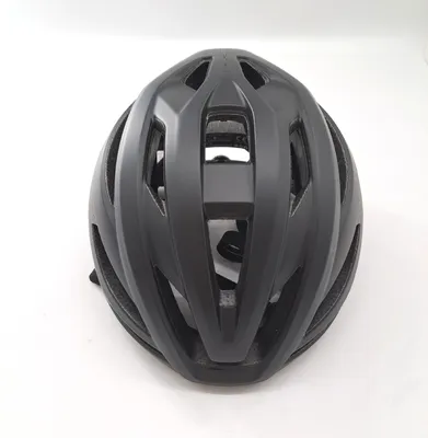 A black bicycle helmet is shown from a top-down perspective against a white background.