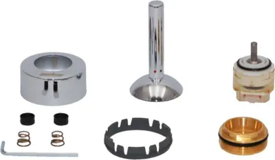 A collection of plumbing parts laid out on a white background.