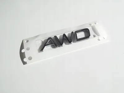 Obrázek produktu pro VOLVO AWD emblém na zadních dveřích 9157130 , originální a od autorizovaného prodejce