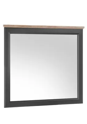 A mirror with a dark gray frame and a wooden top.