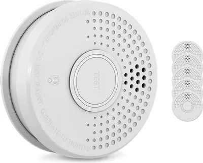 A white smoke detector is shown on a white background, with a set of five additional smoke detectors to the right.