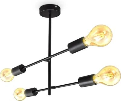 A black chandelier with four Edison-style light bulbs.