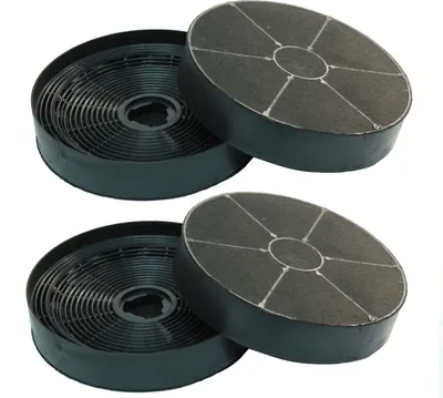 Two pairs of round charcoal filters for a range hood.