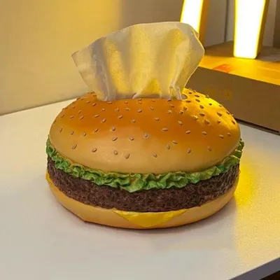 Immagine prodotto di Portatovaglioli a forma di hamburger, realizzato in resina leggera.