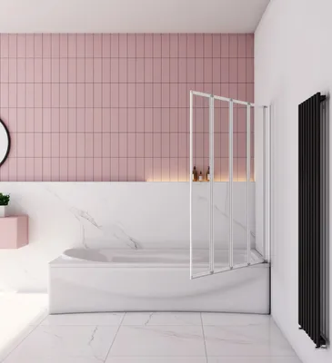 A modern bathroom with a white bathtub, pink tiled wall, and a foldable shower screen.