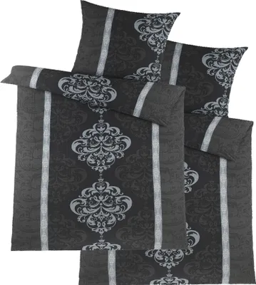 A set of bedding, including a duvet cover and pillowcases, displayed on a white background.