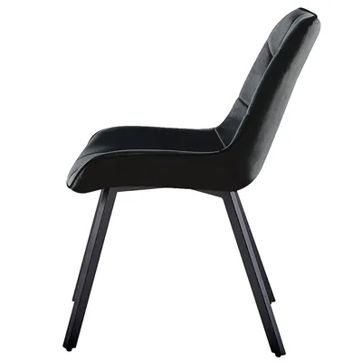 A side view of a black upholstered chair with metal legs.