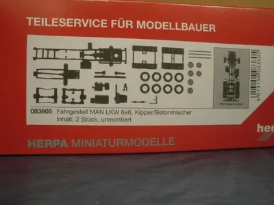 Produktbild von Herpa Z Zurüstteil Fahrgestell MAN LKW 6x6 2 Stück