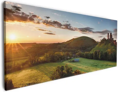 Produktbild von Wallario Premium Leinwandbild Schlosspanorama in England bei Sonnenaufgang in Größe 60 x 150 cm