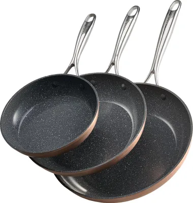 Three frying pans of different sizes are arranged in a staggered formation against a white background.