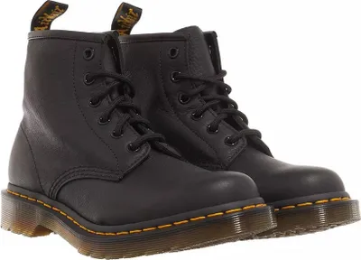 A pair of black Dr. Martens boots.