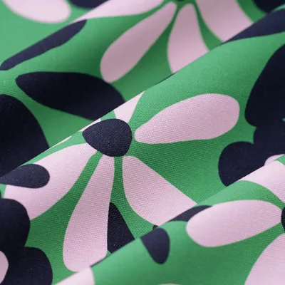 Imagen del producto de Tela de algodón con estampado de grandes flores, 140 cm de ancho, en colores verde y azul marino, con certificación