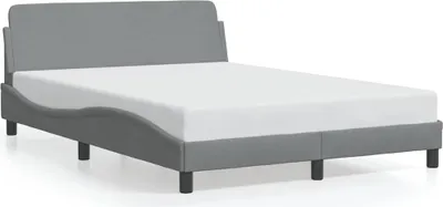 A gray fabric bed frame with a white mattress on a white background.