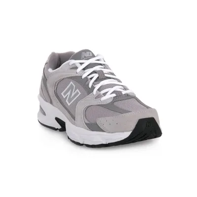 A single New Balance sneaker is shown from a diagonal angle against a white background.
