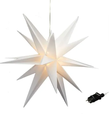 A white, multi-pointed star-shaped lamp with an LED light inside, hanging from a thin wire. A black power plug with a white cord is visible in the lower right corner.