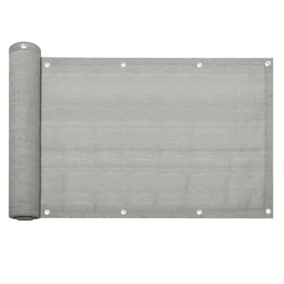 A rolled-up piece of grey fabric with grommets along the edges, likely a balcony screen or privacy fence.