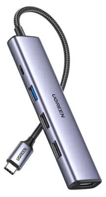 A UGREEN USB-C hub is shown against a light gray background.