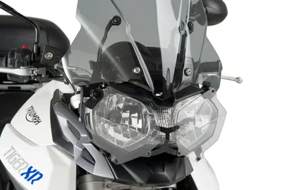 Zdjęcie produktu dla Osłona reflektora PUIG 8124W pasuje do TRIUMPH TIGER 800 Przezroczysty