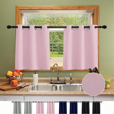 A kitchen scene with pink curtains over a window, a sink, and a fruit bowl.