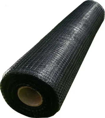 A roll of black mesh fencing on a white background.