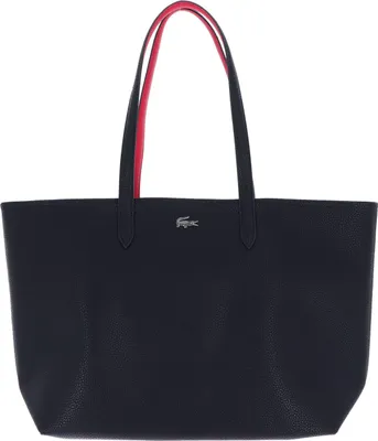 A dark blue tote bag with red handles is shown against a white background.